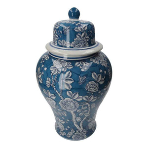 Potiche en porcelaine bleue à décor de fleurs blanches et papillons