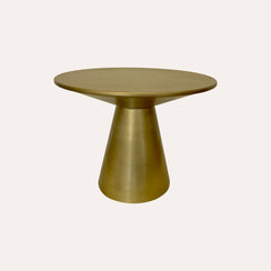 Table basse ronde en métal doré avec finition brillante et base allongée