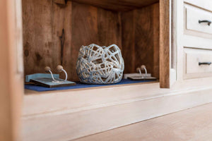 Decorative candle holder in pale blue ceramic