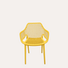 Sillón perforado de polipropileno amarillo mate 56x60x82 cm